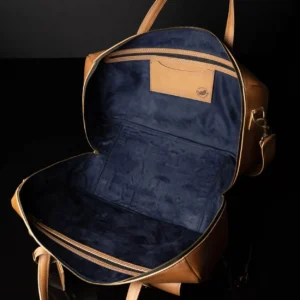 Open view of Marcella Overnight Duffle Bag in tan leather, showcasing its spacious interior and premium lining.