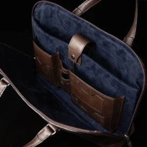 Interior of Reagan Euro brown leather laptop bag, with spacious compartments for organized storage.
