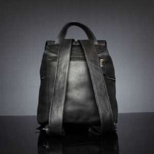 Back view of Women’s Explorer Medium Backpack in black leather, featuring adjustable shoulder straps and a top carry handle.