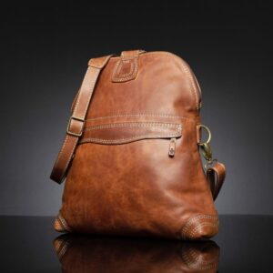 Women's Monroe 2-in-1 bag in rich brown leather, standing upright, highlighting the smooth full-grain leather and craftsmanship.