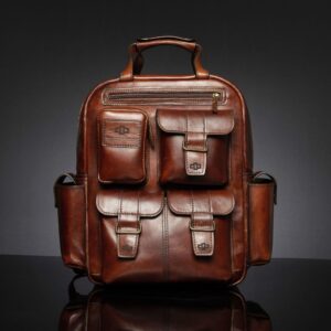 Franklin men's leather laptop backpack in polished brown, crafted from full-grain leather with a structured vintage design.