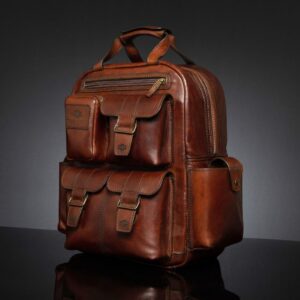 Front view of Franklin men's leather backpack, featuring dual buckle pockets and premium polished brown leather.