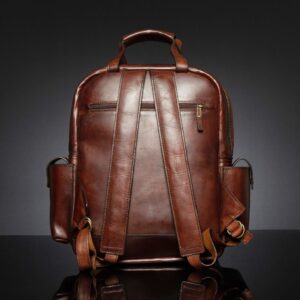 Back view of Franklin men's leather backpack, showing padded shoulder straps and a back zip compartment for easy access.