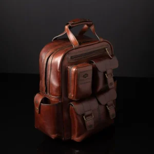 Franklin men's leather backpack in an upright position, showcasing its structured design and durable brass hardware.