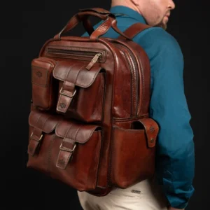 Man wearing Franklin leather backpack, displaying its sophisticated design and ideal fit for business and travel.