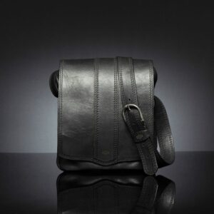 Black Indiana men's leather sling bag with structured design, flap closure, and premium craftsmanship.