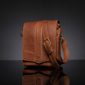 Indiana men's leather sling bag in rich brown, showcasing premium full-grain leather and reinforced stitching.