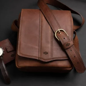 Lifestyle shot of the Indiana rich brown leather sling bag, emphasizing its versatility and sophisticated appeal.
