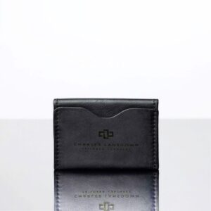 Men’s Dakota Bifold Cardholder in black. Full-grain leather, minimalist design, curved slots, and embossed Charles Lansdown logo.