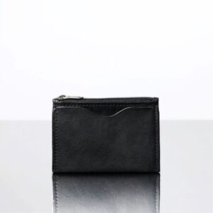 Close-up of men’s black Dakota Zipped Cardholder. Features two curved card slots, high-quality leather, and a zip compartment.