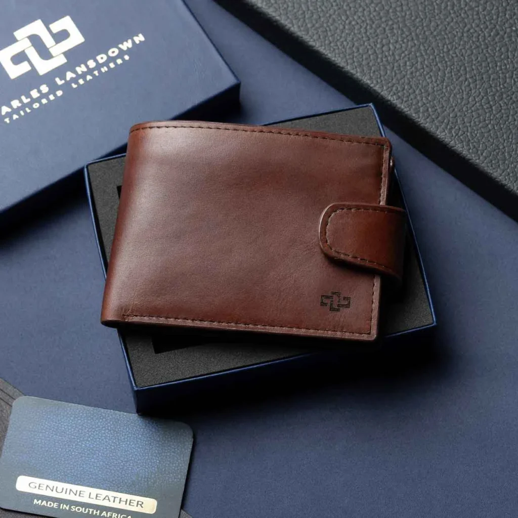 Men’s Benedict Large Window Tab Wallet in rich brown leather, elegantly displayed in a Charles Lansdown gift box for luxury appeal.