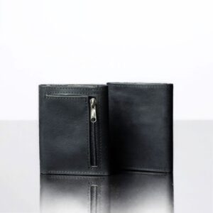 Men’s Ashford black trifold wallets side by side, showing one with a zip coin pouch and another with a minimalist design.