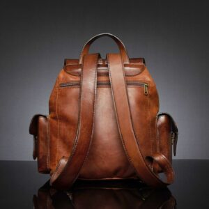 Back view of Explorer Large Backpack in vintage brown leather, highlighting adjustable straps and spacious back zip compartment.