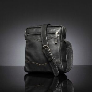Side view of the black Montrose Sling Bag, highlighting premium leather texture and reinforced stitching.
