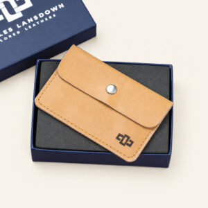 Women's Monroe envelope leather cardholder in desert tan, presented in its Charles Lansdown gift box.
