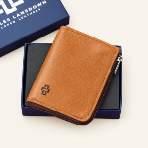 Women's Amelie zipped leather cardholder in rich tan, presented in its Charles Lansdown gift box.