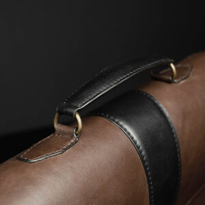 Detailed view of Svelte Laptop Bag’s black leather handle, showcasing smooth edges and reinforced stitching.