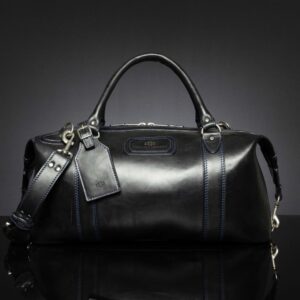 Mansfield Duffle Bag in black full-grain leather, featuring a structured travel-ready design.