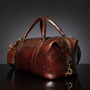 Side profile of Mansfield Duffle Bag in vintage brown leather, showcasing its spacious interior and durable leather straps.