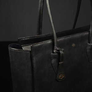A close-up of the bag’s secure zip closure, offering added protection for daily essentials.