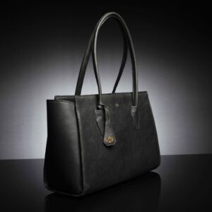 A black leather Aria Tote Laptop Bag with a structured silhouette, flared sides, and sturdy rolled handles.