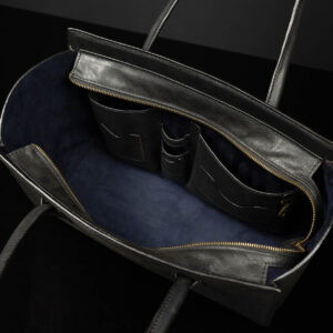 Inside view of the Aria Tote Laptop Bag, displaying the organized interior with multiple compartments.