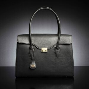 Women's black genuine leather laptop tote bag with a structured silhouette, gold-tone lock, and top handles for a professional look.