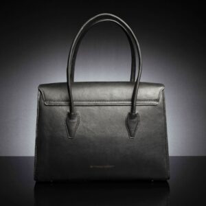 Back view of the women's black leather laptop tote bag, showcasing its structured design and sturdy handles.