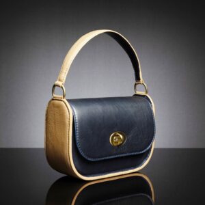 Luminara structured leather bag with tan trim, designed for both formal and casual styling with a polished finish.