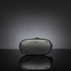 Women's tote bag with zip closure, compacted flat to show flexible and lightweight design.