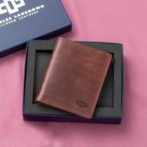 Luxury rich brown leather Gizelle bifold purse, presented in a stylish gift box, offering multiple card slots and a refined handcrafted design.