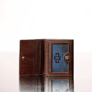 Rich brown trifold leather purse slightly open, revealing organized storage compartments for everyday essentials.