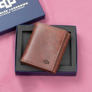 Stylish rich brown leather Gizelle trifold purse, presented in a premium gift box, crafted for elegance with multiple card slots and a sophisticated finish.