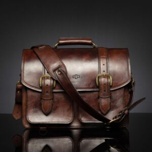 Benjamin Classic Laptop Bag in vintage brown leather, showcasing its detachable and adjustable shoulder strap for versatile carrying.