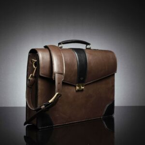 Angled view of the Svelte Laptop Bag, highlighting its two-tone brown and black leather contrast and refined craftsmanship.