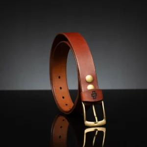 Elegant rich tan leather belt, 35mm width, shown in a close-up side profile view.