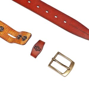 Rich tan leather belt with interchangeable buckle system, featuring antique brass and silver buckle options.
