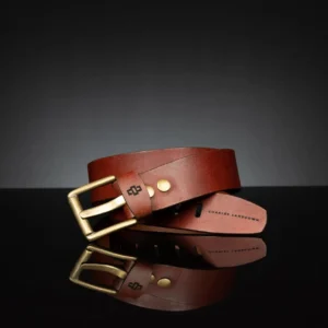 Casual rich tan leather belt, 50mm width, featuring an antique brass buckle for a rugged style.