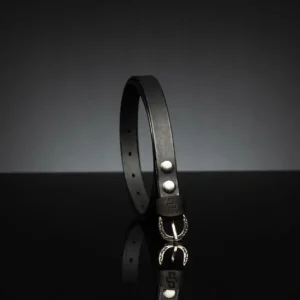 Slim black leather belt for women, 20mm width, featuring a refined buckle design.