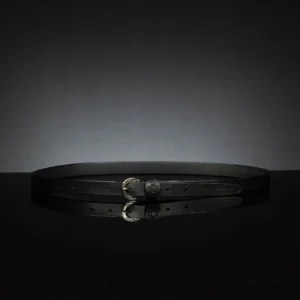 Slim 20mm black leather belt for women, perfect for defining the waist over dresses and blazers.