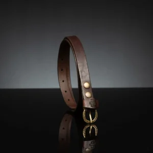 Slim brown leather belt for women, 20mm wide, perfect for waist definition over dresses.
