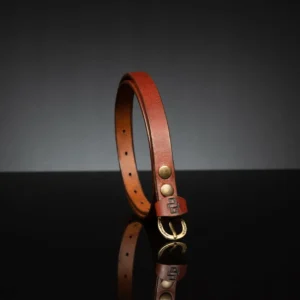 Exclusive rich tan leather skinny belt, 20mm wide, crafted for trendsetting women.