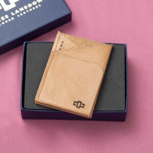 Elegantly boxed and ready to impress, the Arabella cardholder in tan makes for a refined leather accessory.