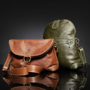 Women's Monroe 2-in-1 bag in full-grain leather, shown as a folded sling bag and upright backpack, highlighting versatility.