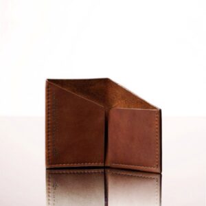 Rich brown women’s leather cardholder with a geometric design, perfect for storing cards and folded notes in style.