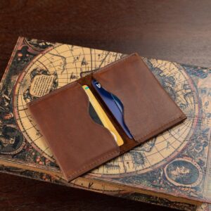 Rich brown leather bifold cardholder, handcrafted for women, slim and sophisticated for minimalist style.