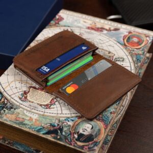 Men’s rich brown leather cardholder in use. A sleek and practical pouch wallet for storing multiple cards and essentials.