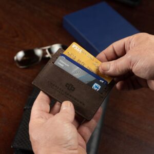 Men’s brown leather Mansfield V6 Cardholder in use. Slim, durable, and stylish with multiple card slots and refined craftsmanship.