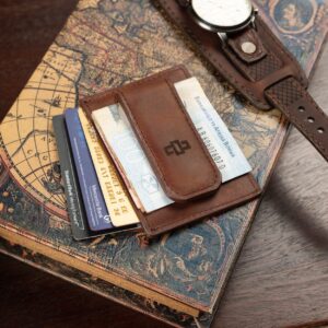 Angled view of the rich brown leather moneyclip cardholder, showing compact and sleek construction for everyday use.