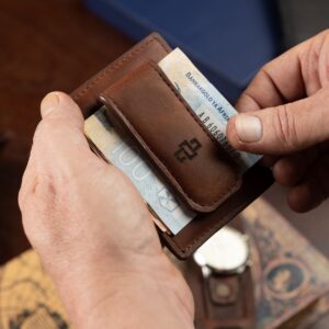 Belvoir money clip in rich brown leather displayed closed, featuring strong magnets and secure note holding